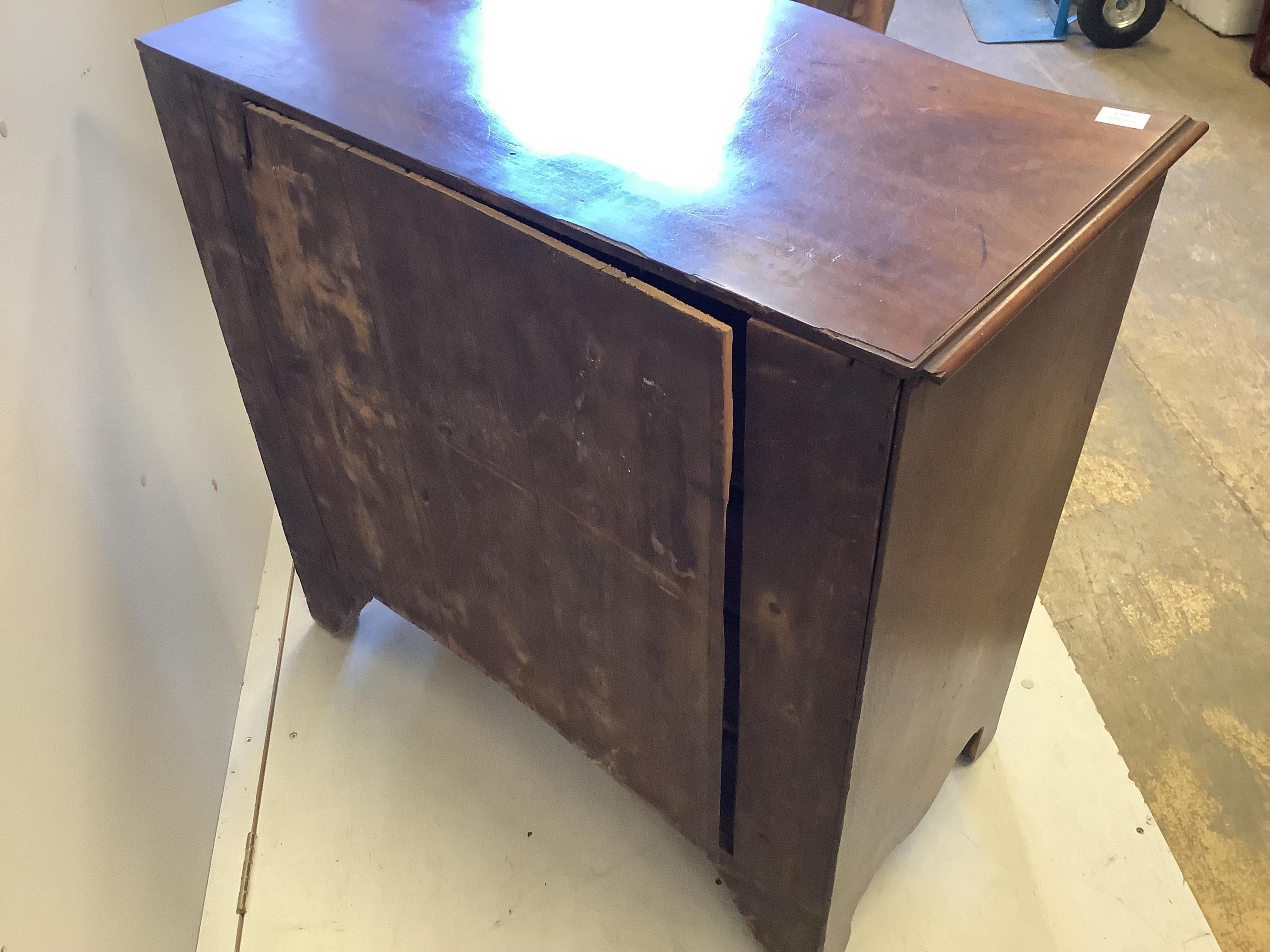 A George III mahogany serpentine chest with brushing slide, width 95cm, depth 52cm, height 91cm